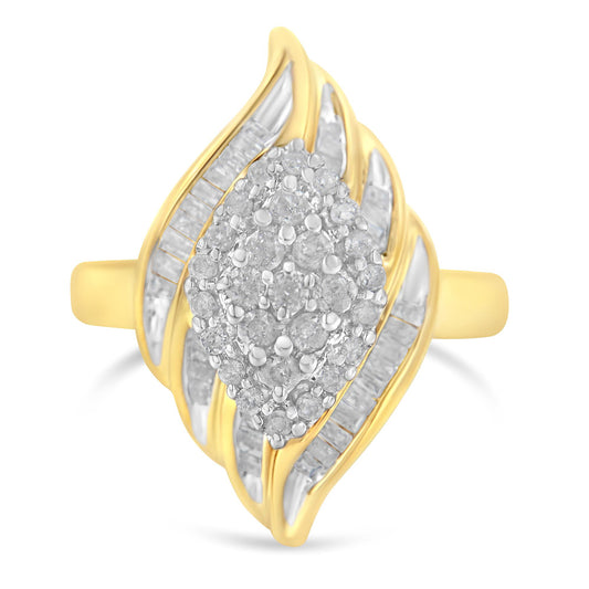 Front angle view of a yellow metal ring featuring a marquise cluster of round white gemstones in prong settings at the center, surrounded by curved bands with channel-set white baguette gemstones.