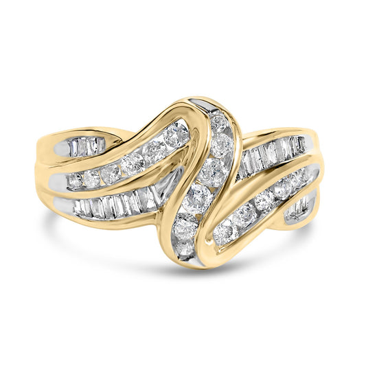 Yellow metal ring with intertwined bands set with round and baguette white gemstones in channel settings, shown in a front angle view.