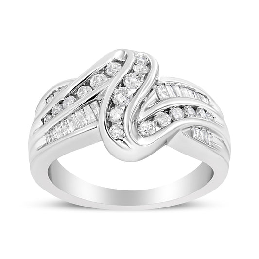White metal ring with intertwined design featuring channel-set round and baguette-shaped white gemstones, shown from a front angled view.