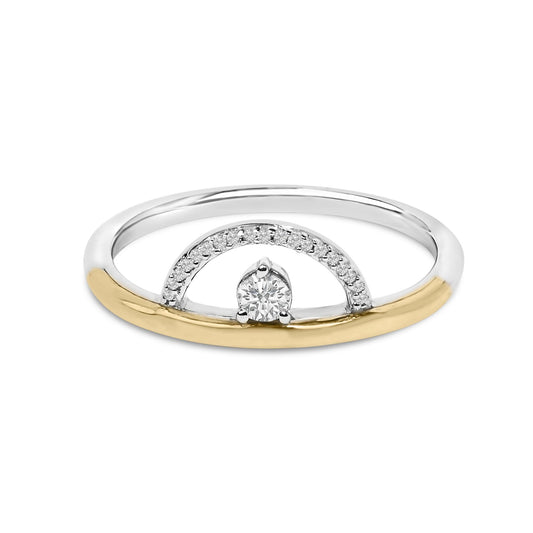 Close-up front view of a two-tone ring featuring a central round white gemstone in a three-prong setting, accented by a semicircle of smaller round white gemstones in a shared prong setting on the upper half.