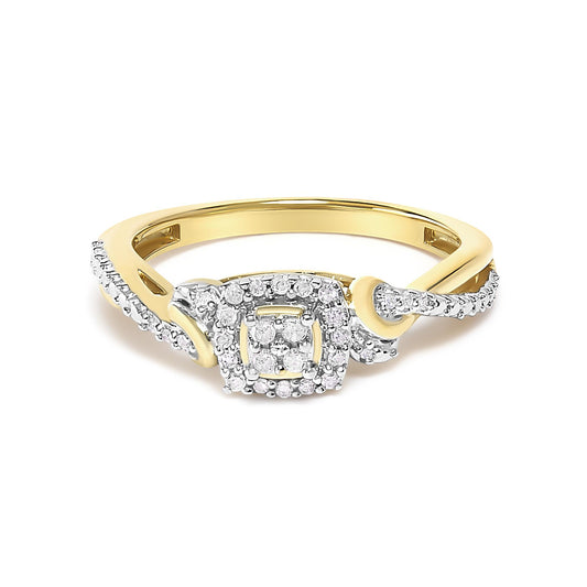 Yellow metal ring with a square cluster of white round gemstones in prong settings at the center, surrounded by a twisted band partially paved with white round gemstones. Ring shown in a front-facing angle.