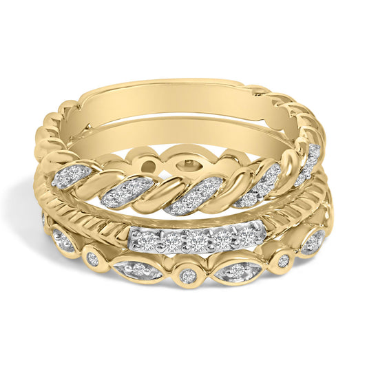 Close-up front angle shot of three stacked yellow and white metal rings with round white gemstones in pave and bezel settings, featuring twisted and braided designs.