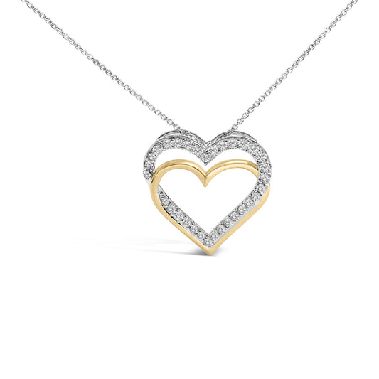 Close-up front view of a heart-shaped necklace pendant featuring yellow and white metal, with round white gemstones in prong settings outlining the heart.