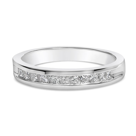 Close-up front angle of a white metal ring with a channel setting of princess-shaped white gemstones in a row.