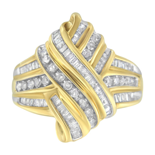 Close-up of a yellow ring with white round and baguette shaped gemstones in channel settings, displayed from a front angle.