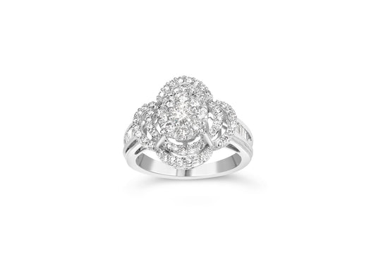 Front angle of a white ring with a central round prong-set white gemstone, surrounded by multiple smaller round prong-set white gemstones forming a floral design, and accented by baguette channel-set white gemstones on the band.