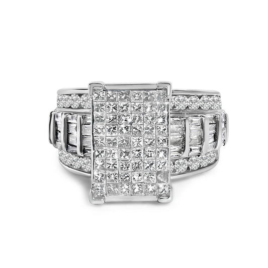 Close-up angled view of a white metal ring featuring a rectangular cluster of princess cut white gemstones in an invisible setting on top, with rows of baguette and round white gemstones set in channels along the band.