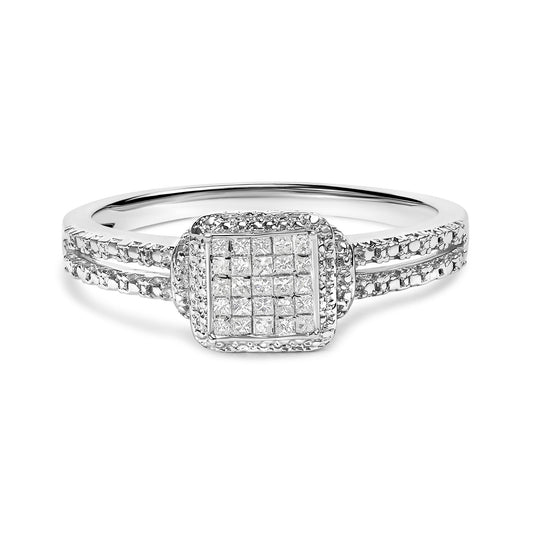 Front-facing view of a white metal ring featuring a square cluster of princess-shaped white gemstones in an invisible setting, with additional rows of small white gemstones on the split band.