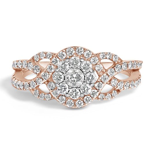 Close-up angled view of a rose metal ring featuring multiple prong-set round white gemstones arranged in a floral cluster and along the twisting band.