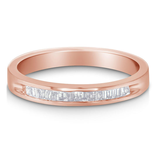 Rose metal ring shown from a front angle with a channel set row of white baguette-shaped gemstones.
