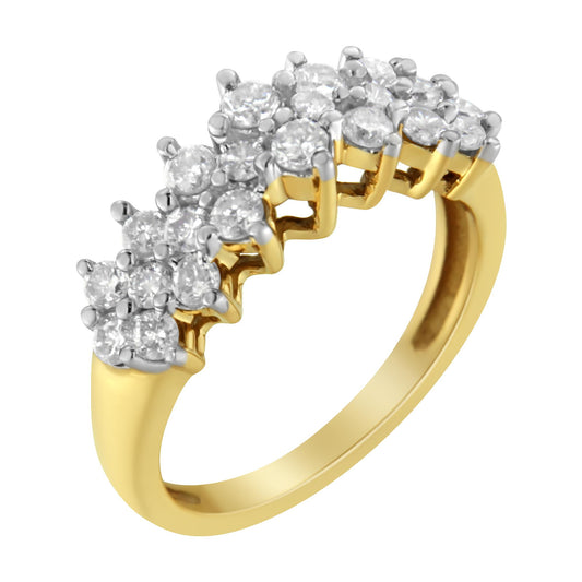 Yellow ring with multiple prong-set round white gemstones, angled top view.