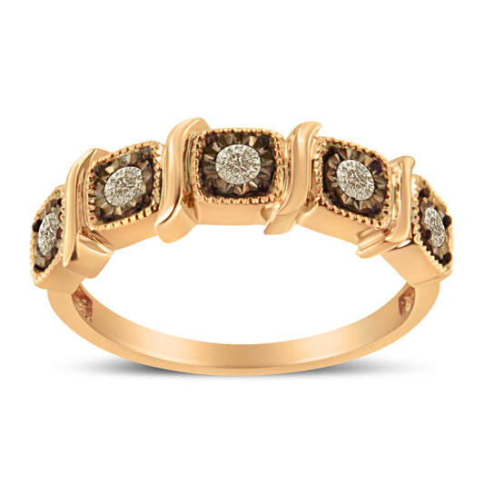 Close-up front angle of a rose-colored ring featuring five square settings with round white gemstones in miracle settings.