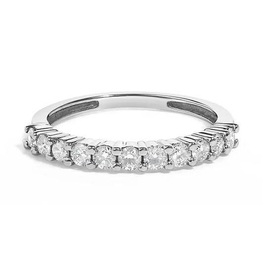 White metal ring with round white gemstones in prong settings along the top, shown from a front angle.