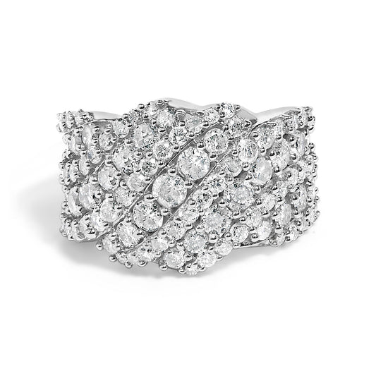 White metal ring with multiple rows of round white gemstones in prong settings, shown from a front angle.