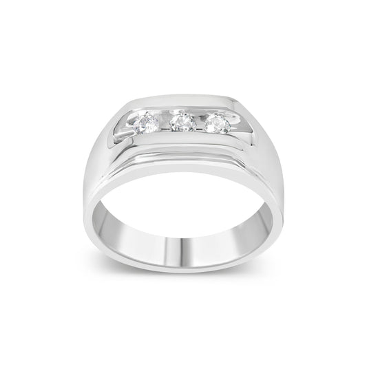 Front angled view of a white metal ring with three round white gemstones set in a channel setting.