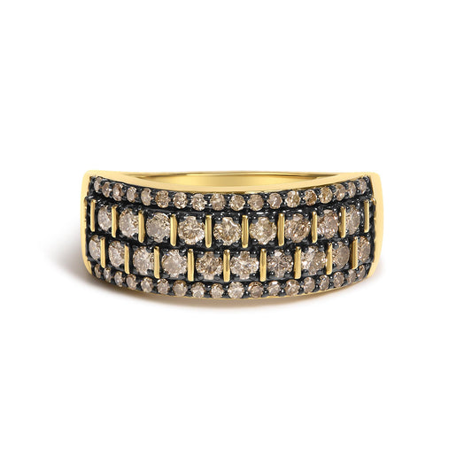 Close-up front view of a yellow metal ring with three rows of round champagne-colored gemstones in prong settings, shown on a white background.