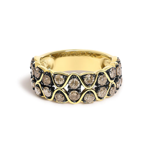 Close-up front angle of a yellow metal ring featuring two rows of round white gemstones in prong settings separated by a wavy metal design.