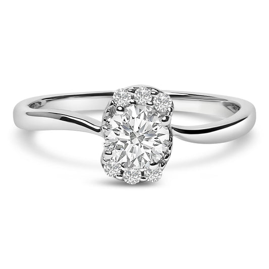 Close-up front view of a white metal ring featuring a large round white gemstone in the center surrounded by multiple smaller round white gemstones in prong settings.