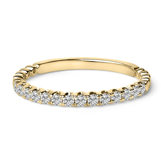 Close-up front angle of a yellow band ring featuring a row of round white gemstones in prong settings along the top half.