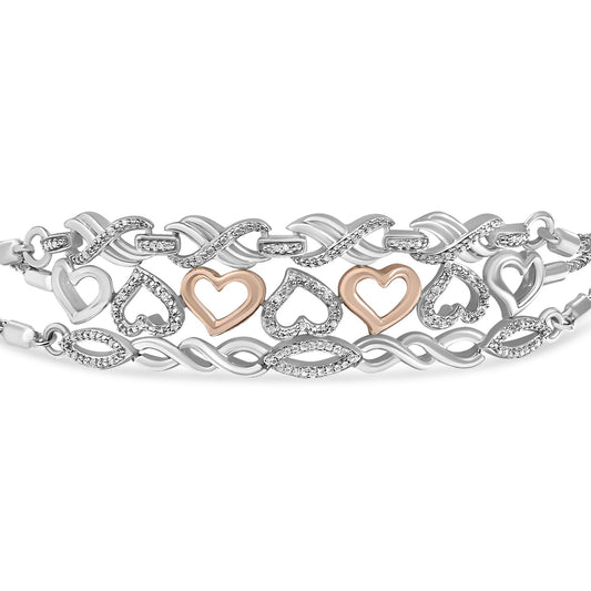 Close-up front view of a white metal jewelry set featuring three bracelets with alternating heart shapes and round white gemstones in prong settings, displayed flat on a white background.
