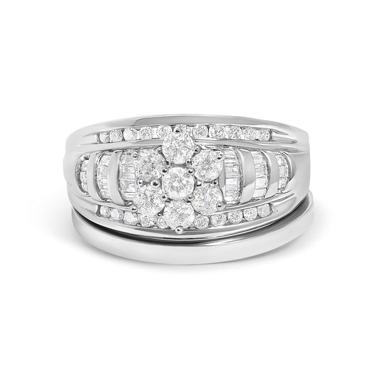 Front angled view of a white metal ring featuring a central cluster of round white gemstones surrounded by channel-set round and baguette white gemstones. The ring is shown alone on a white background.