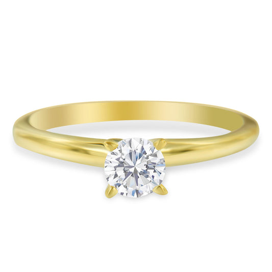 Front angle of a yellow metal ring with a round white gemstone in a prong setting.