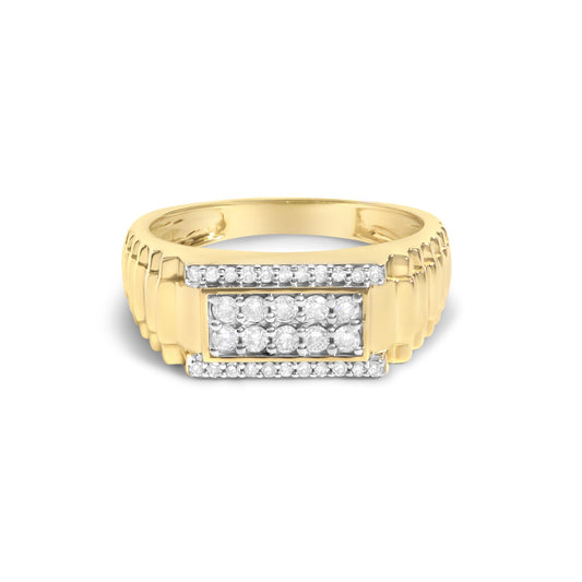Close-up front view of a yellow ring with two rectangular sections of round white gemstones in prong settings on the top.