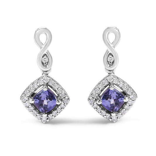 Pair of white metal earrings shown front-facing, featuring blue cushion-shaped gemstones surrounded by round white gemstones, with an infinity loop detail at the top.