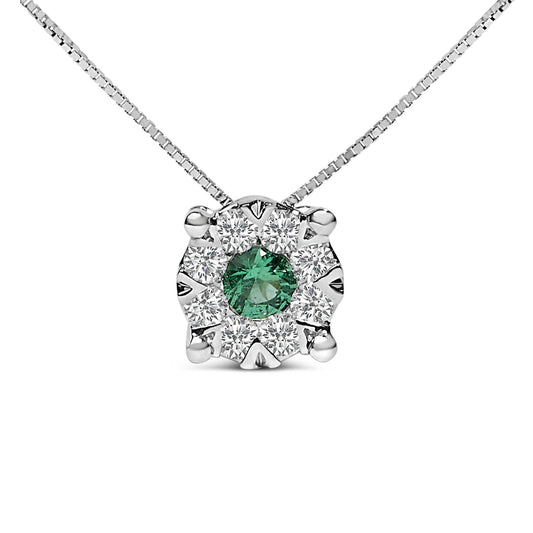 Close-up front view of a white metal necklace with a round green gemstone in the center, surrounded by round white gemstones in a pave setting.