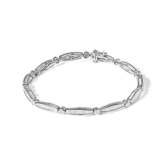 White metal bracelet with alternating sections of bezel-set round white gemstones and channel-set baguette white gemstones, shown from a slightly angled top view.