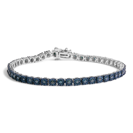 Close-up front angle of a white metal bracelet featuring a continuous row of round blue gemstones with miracle setting.