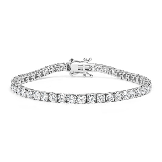 White metal tennis bracelet with round white gemstones in four-prong settings, shown from front angle on a white background.