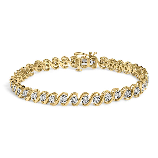 Bracelet with yellow and white metal twisted design and round white gemstones, shown from a front angle.