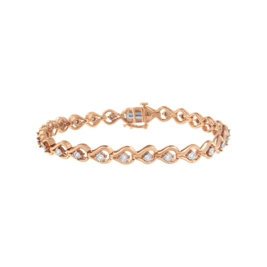 Rose metal bracelet with round white gemstones in miracle setting, shown from a front angle on a white background.