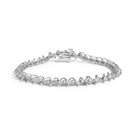 White metal bracelet with round white gemstones in a miracle setting, shown from a front angle.