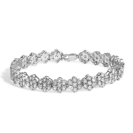 White metal bracelet with flower-shaped links each set with round white gemstones, shown from a front angle.