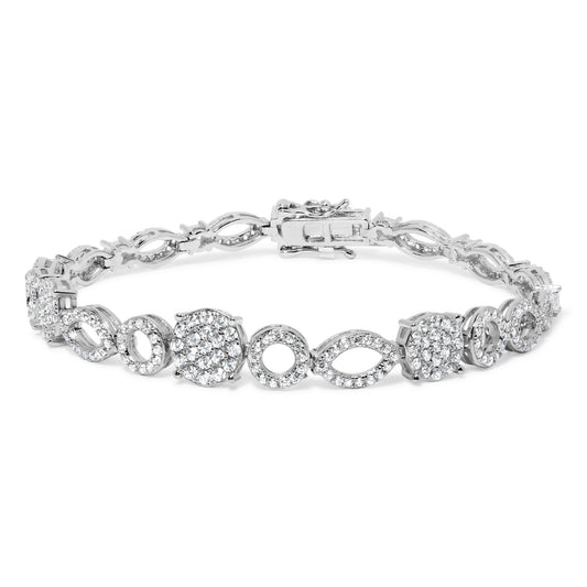Close-up front angle of a white metal bracelet featuring alternating circular and marquise-shaped links adorned with white gemstones in shared prong settings, shown on a white background.