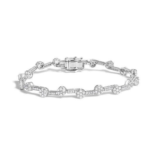 White metal bracelet with round white gemstones in prong settings arranged in a linked pattern, shown from a front angle on a white background.