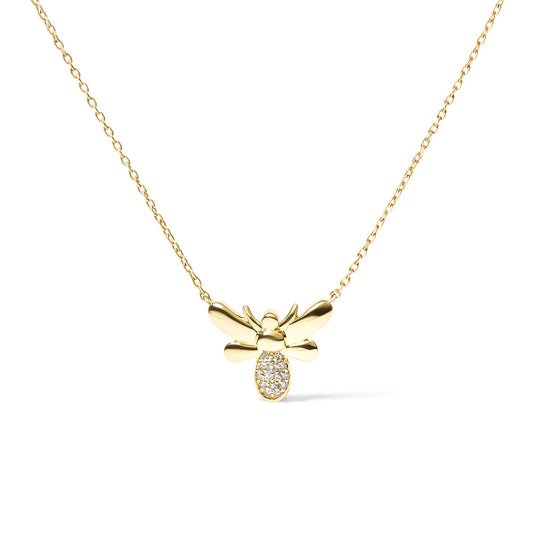 Front view of yellow metal necklace with bee-shaped pendant featuring white round gemstones in pave setting on the lower part of the bee.