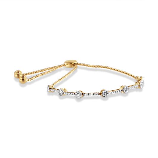 Yellow bracelet with round white gemstones in prong settings along the front, shown from a front angle on a white background.