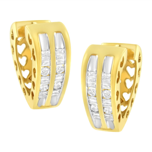 Pair of yellow metal earrings with channel-set white round and baguette gemstones, shown in a front angle view.