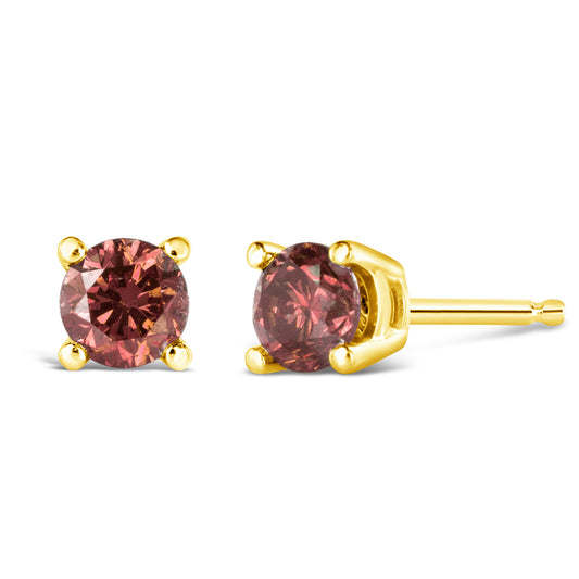 Pair of yellow metal stud earrings with round pink gemstones in 4-prong settings, shown from front and side angles.