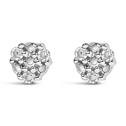 Front view of a pair of white metal stud earrings with multiple round white gemstones in prong settings.