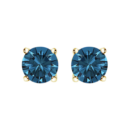 Front view of yellow metal stud earrings with round blue gemstones in four-prong settings.