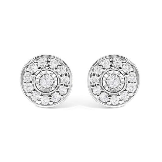Pair of round white metal stud earrings with concentric circles of prong-set white gemstones, shown in a front close-up view on a white background.
