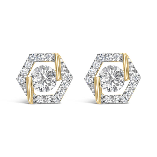 Front view of a pair of yellow metal earrings with a hexagonal outer shape set with small white gemstones and a larger white gemstone in the center, shown on a white background.