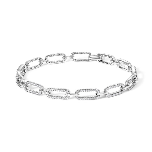 White bracelet composed of rectangular links with prong-set round white gemstones, shown in a top-down view on a white background.