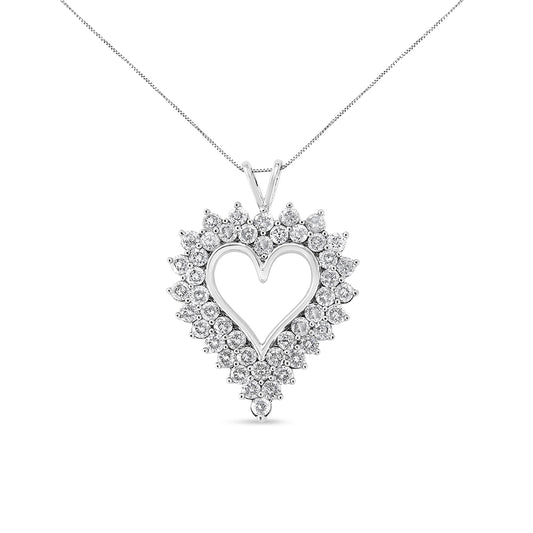 Front-facing shot of a white metal heart-shaped necklace pendant adorned with round brownish gemstones in prong settings, hanging from a delicate chain.