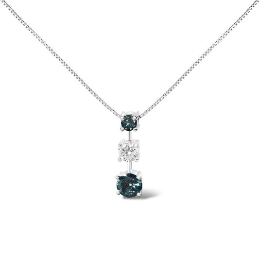 Front-facing shot of a white metal necklace with a vertical pendant featuring one white gemstone flanked above and below by two blue gemstones in prong settings.