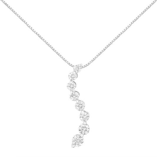 Front view of a white metal necklace with a descending curved row of round brownish gemstones in prong settings.